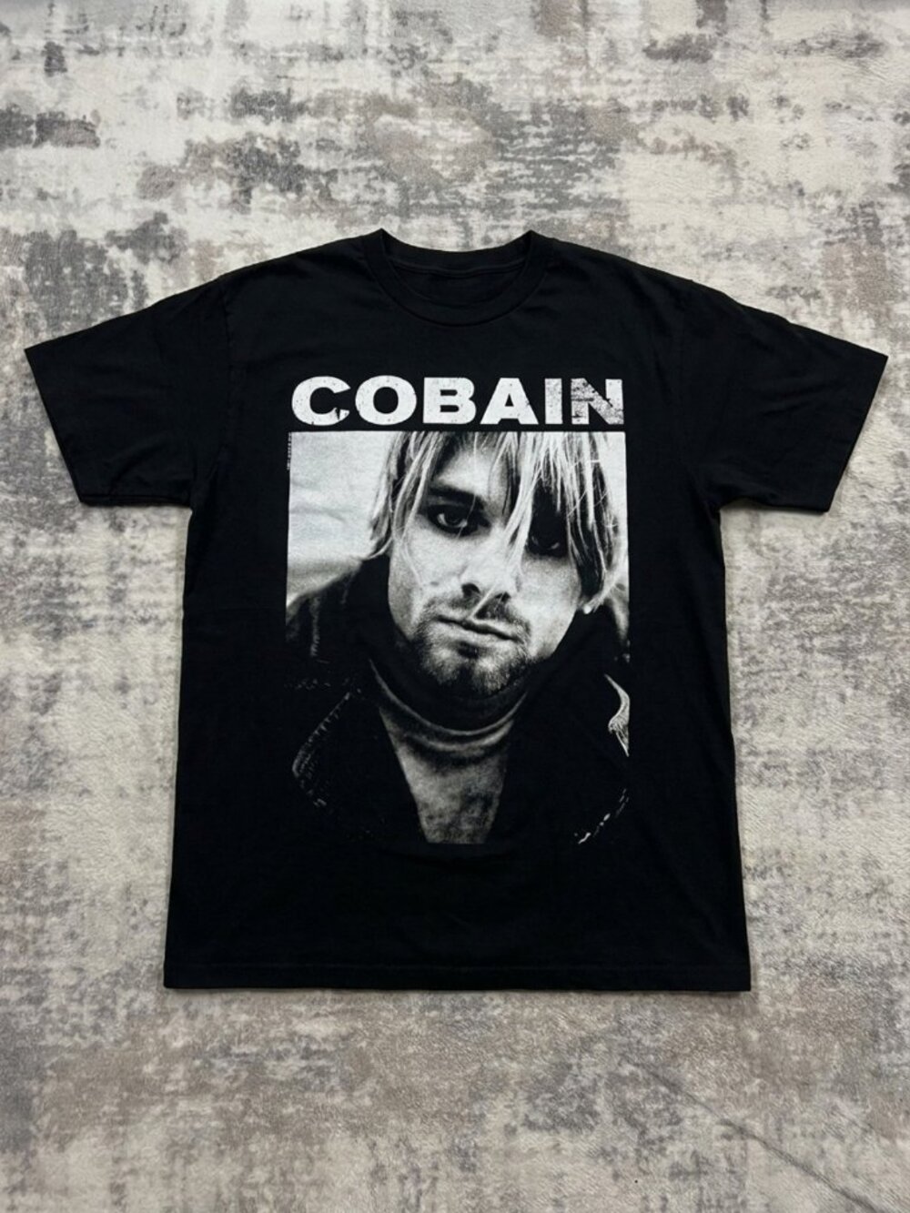 Vintage Distressed Cobain Logo Above Black & Grey Face Close Up Photo Of Kurt We